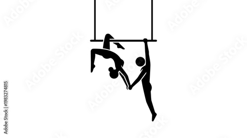 Acrobatic Duo Performing Trapeze Act in Silhouette