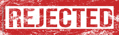 A textured red stamp with the word REJECTED in bold white lettering signifies disapproval or refusal.