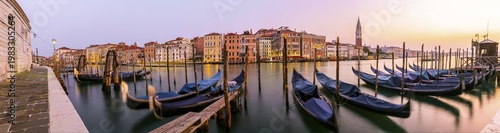 Evening atmosphere, sunset at the Grand Canal, gondolas at the pier, Campanile bell tower, Venice, Veneto region, Italy