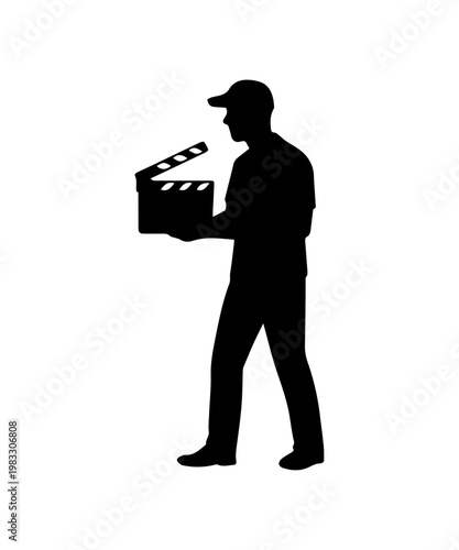 Man holding clapperboard starting film production