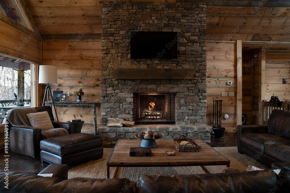 Naklejka premium Main room of a rustic cabin with a fireplace in the Appalachian Mountains