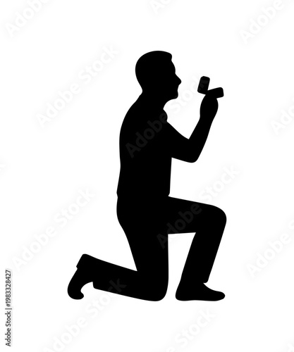 Man kneeling proposing marriage holding engagement ring box