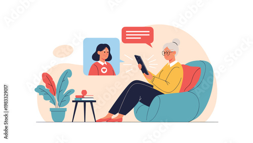 Senior woman relaxing in a blue armchair while using a digital tablet to have a warm video call with a younger woman, showing connection.