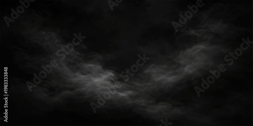 Dark smoke drifting over a black background creating a mysterious abstract atmosphere