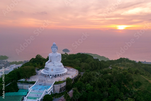 Fotografie Aerial top sunset view magnificent white marble Buddha statue sits serenely atop