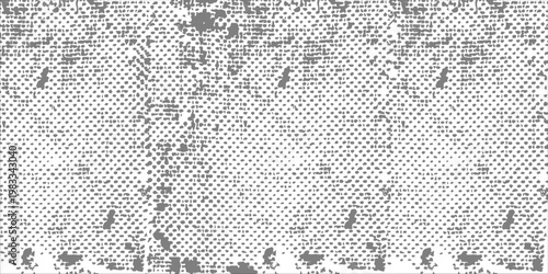 Abstract gray halftone dot pattern on a white background. Distorted retro pop art texture with a weathered, grainy aesthetic for grunge and vintage designs.
