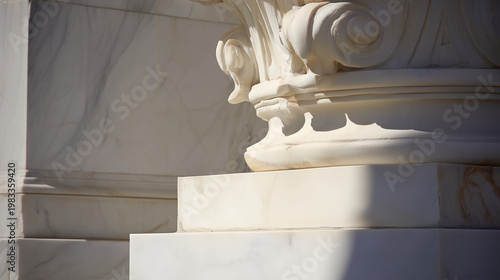 Minimalist architectural column detail in concrete with dramatic side lighting and monochrome tones. real-estate listings.