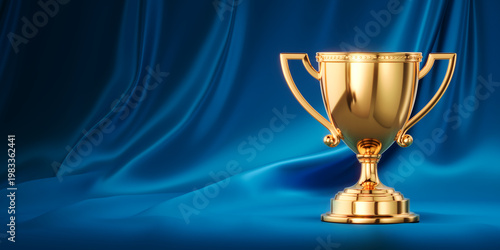 Obraz na płótnie First place gold trophy cup on Blue silk cloth background