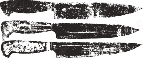 Three rustic vintage kitchen knives with wooden handles in a grunge silhouette