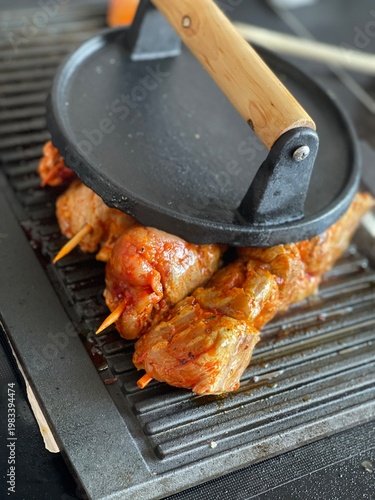 Close up of grilling chicke...