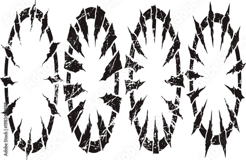 four grunge cracked circular designs with jagged edges and radial shattered patterns