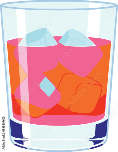 A glass contains a cold drink with ice cubes on a table indoors.