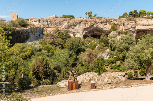 Wallpaper Mural The Latomia del Paradiso inside the Neapolis Archaeological Park in Syracuse, Sicily, Italy. Historic archaeological site connected to Greek and Roman history. Torontodigital.ca