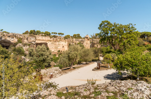 Wallpaper Mural The Latomia del Paradiso inside the Neapolis Archaeological Park in Syracuse, Sicily, Italy. Historic archaeological site connected to Greek and Roman history. Torontodigital.ca