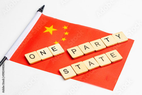The flag of China with One Party State spelt across it
