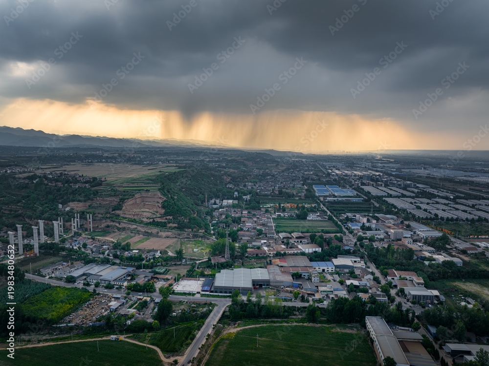 Obraz premium curtain of rain over the qinling mountains in shaanxi, china