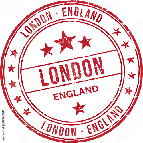 A close-up view of a London England travel stamp with stars