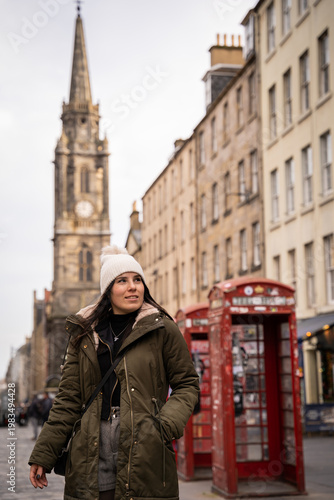 Young woman exploring the historic streets of Edinburgh