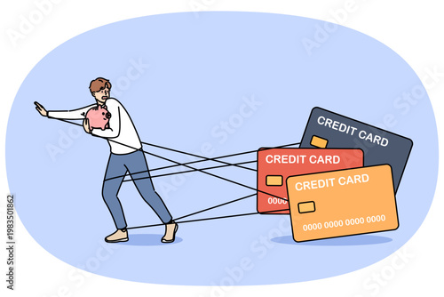 Man debtor has become hostage to loans and is running away from bank cards holding piggy bank in hands. Problems of credit dependence are caused by lack of freedom of guy who owes money