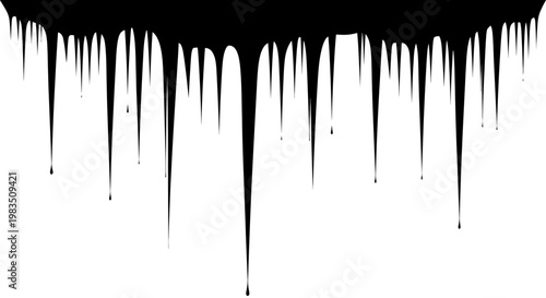Black paint drips falling down on white background creating a grunge effect texture