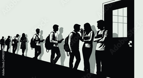 A line of people mostly students stand and converse near a doorway in a hallway