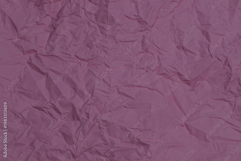 Fototapeta premium Pink crumpled paper texture as background