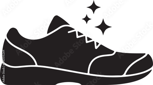 Elegant classic black leather oxford shoe with shining polish and brush for shoe care. Polished Footwear Shine Symbol