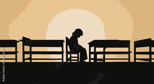 A silhouetted child sits at a school desk against a bright warm sunset backdrop