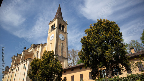 Historic Church with Steeple and Clock Tower in a European Village