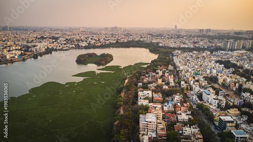 Aerial view of Bangalore lake showing environmental health, urban pollution and shrinking water bodies amid rapid city development