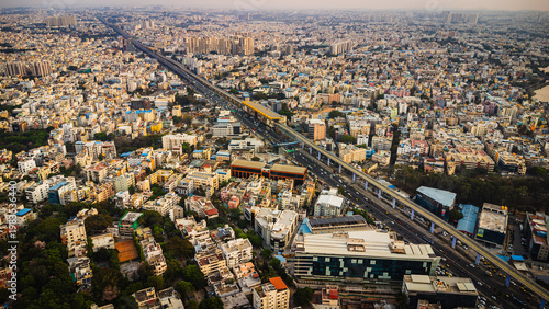 Foto Aerial view of Bangalore urban infrastructure featuring metro line, highways and