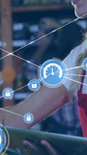 Vertical video: Store clerk holding tablet over lemons showing HUD nodes across her tracking stock