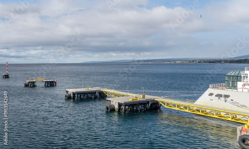 discontinuous pier at harbor on strait shore, Punta Arenas, Chile