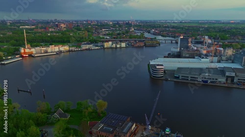 Aerial view of windmills at famous tourist site Zaanse Schans in Holland on sunset. Zaandam, Netherlands