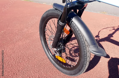 Folding bike details and close-up. Bike assembly. An electric bike that can be folded