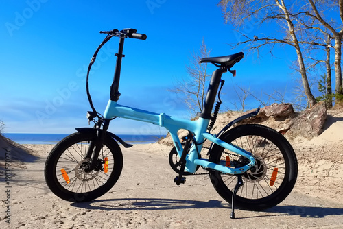 Folding bike details and close-up. Bike assembly. An electric bike that can be folded