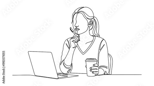 woman sitting with laptop and coffee.