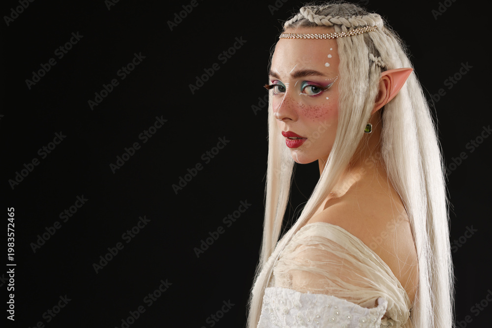 Naklejka premium Portrait of beautiful elf girl on black background, space for text