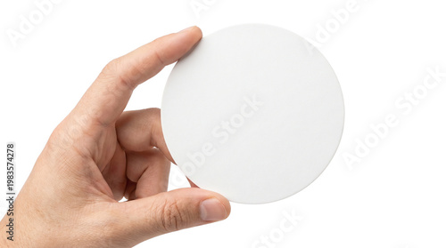 Hand holding a blank white round circle card or coaster for mockup. Isolated on transparent background, png
