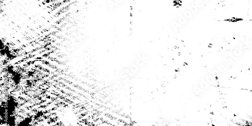 Abstract black and white grunge texture background with heavy ink splatters, weathered distressed surface for overlay effects, industrial vintage grainy wall with scratched details and high contrast.