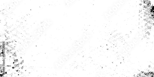 Abstract black and white grunge texture background with heavy ink splatters, weathered distressed surface for overlay effects, industrial vintage grainy wall with scratched details and high contrast.