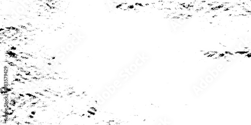 Abstract black and white grunge texture background with heavy ink splatters, weathered distressed surface for overlay effects, industrial vintage grainy wall with scratched details and high contrast.