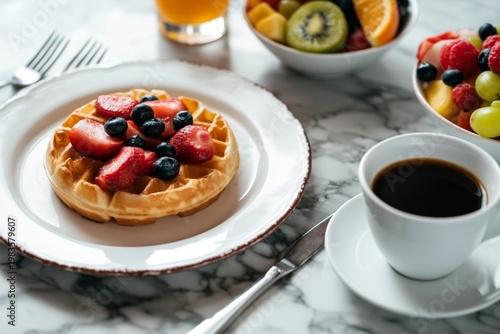 Waffle Topped With Berries and Served With Fruit Bowl and Coffee at a Table i...
