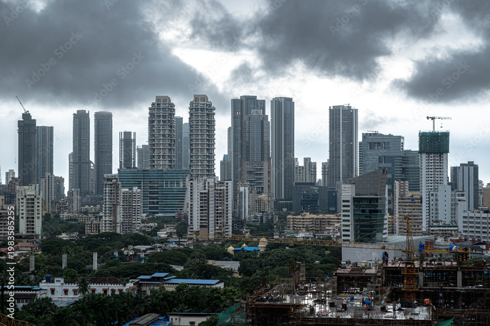 Fototapeta premium Modern City high-rise skyscraper buildings. Aerial drone view of the Financial District in Mumbai. Daytime Mumbai City, India