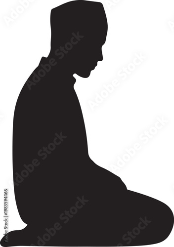 Silhouette of a muslim man in a traditional cap kneeling in prayer isolated on a plain white background for