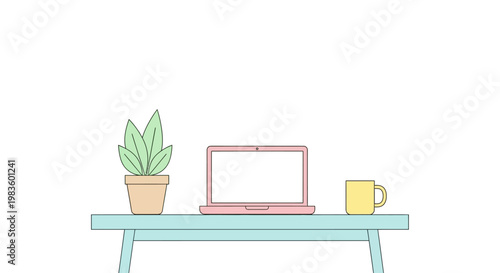 Laptop on a desk with plant.
