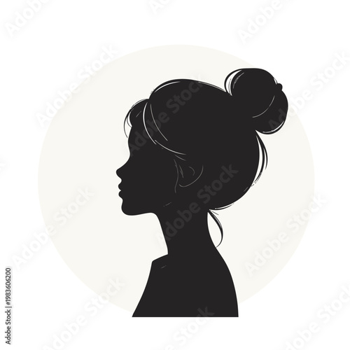 Profile silhouette of woman with messy hair bun