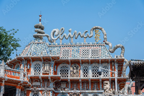 The Porcelain House in Tianjin is a unique and vibrant museum intricately decorated with millions of pieces of ancient porcelain and pottery. Tianjin, China 22 May 2025