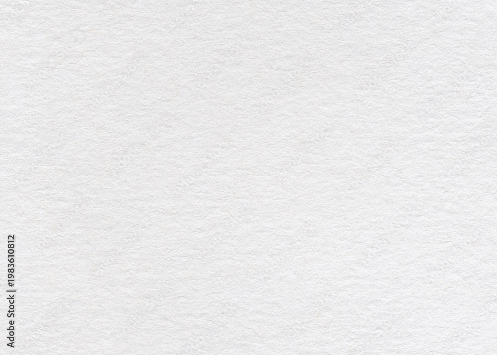 Naklejka premium White paper texture with copy space. Natural grainy paper surface texture for design.