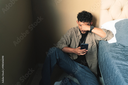 Man receiving bad news on digital device